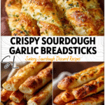 Golden sourdough garlic breadsticks made with sourdough starter discard on a rustic tray.